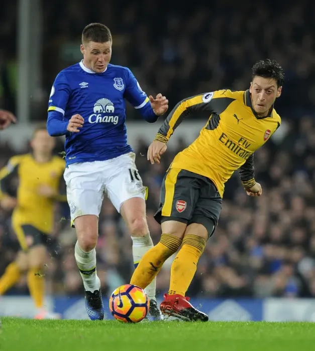 Framed Print : Mesut Ozil vs James McCarthy: Intense Battle at Goodison Park - Everton vs Arsenal, Premier League 2016-17