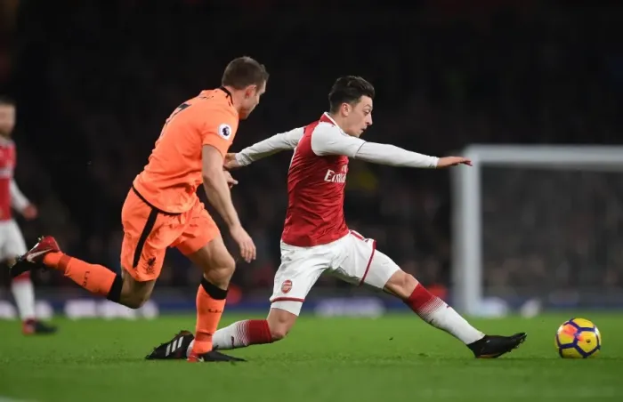 Framed Print : Mesut Ozil vs. James Milner: A Premier League Battle at the Emirates (2017-18)