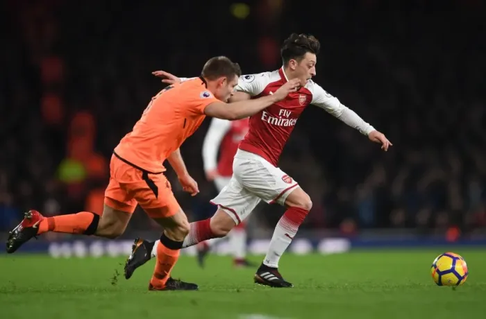 Framed Print : Mesut Ozil vs. James Milner: A Premier League Showdown at the Emirates (2017-18)