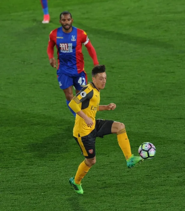 Framed Print : Mesut Ozil vs Jason Puncheon: Intense Battle at Selhurst Park - Crystal Palace vs Arsenal, Premier League 2016-17 Framed Print : Mesut Ozil vs Jason Puncheon: Intense Battle at Selhurst Park - Crystal Palace vs Arsenal, Premier League 2016-17