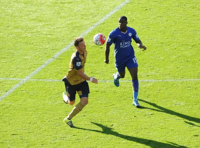 Framed Print : Mesut Ozil vs. Jeffrey Schlupp: A Football Battle at Leicester City vs. Arsenal Framed Print : Mesut Ozil vs. Jeffrey Schlupp: A Football Battle at Leicester City vs. Arsenal