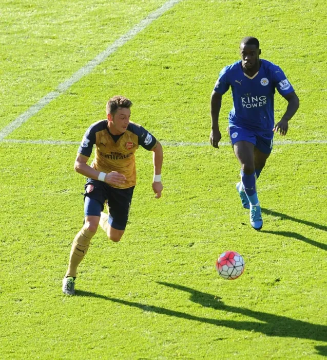 Framed Print : Mesut Ozil vs Jeffrey Schlupp: A Premier League Showdown Framed Print : Mesut Ozil vs Jeffrey Schlupp: A Premier League Showdown