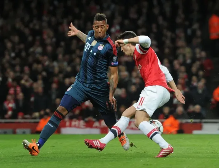 Framed Print : Mesut Ozil vs Jerome Boateng: Penalty Drama in Arsenal vs Bayern Munich UCL Clash