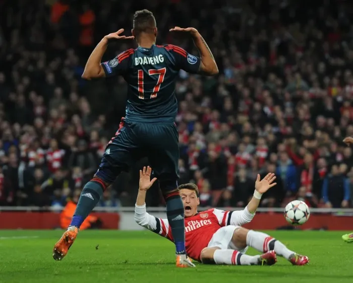 Framed Print : Mesut Ozil vs Jerome Boateng: A Penalty Showdown in the Arsenal vs Bayern Munich UCL Clash Framed Print : Mesut Ozil vs Jerome Boateng: A Penalty Showdown in the Arsenal vs Bayern Munich UCL Clash