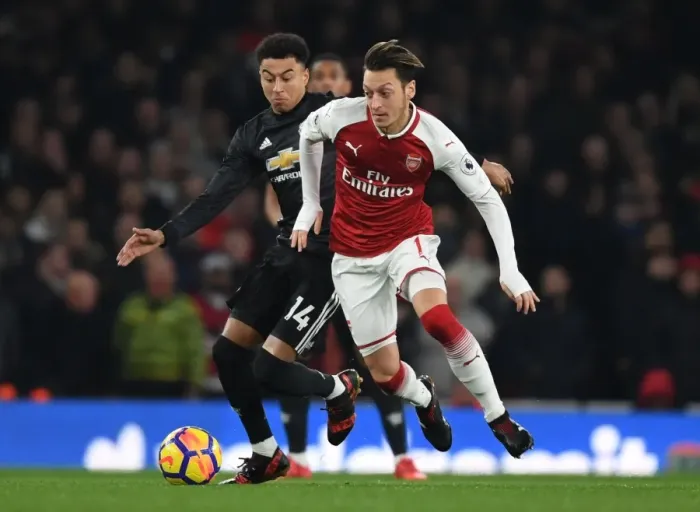 Framed Print : Mesut Ozil vs Jesse Lingard: Battle at the Emirates - Arsenal vs Manchester United, Premier League 2017-18 Framed Print : Mesut Ozil vs Jesse Lingard: Battle at the Emirates - Arsenal vs Manchester United, Premier League 2017-18