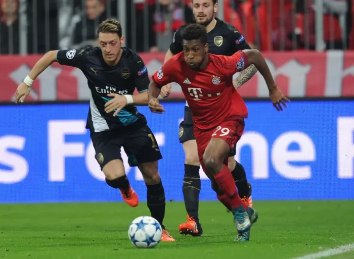 Framed Print : Mesut Ozil vs. Kingsley Coman: A Champions League Showdown
