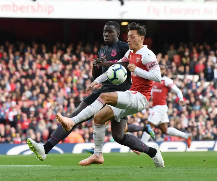 Framed Print : Mesut Ozil vs. Kurt Zouma: Battle at Emirates Stadium - Arsenal v Everton, Premier League 2018-19