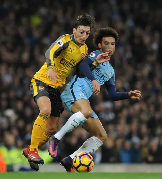 Framed Print : Mesut Ozil vs Leroy Sane: Intense Battle at Etihad Stadium - Manchester City vs Arsenal, Premier League 2016-17