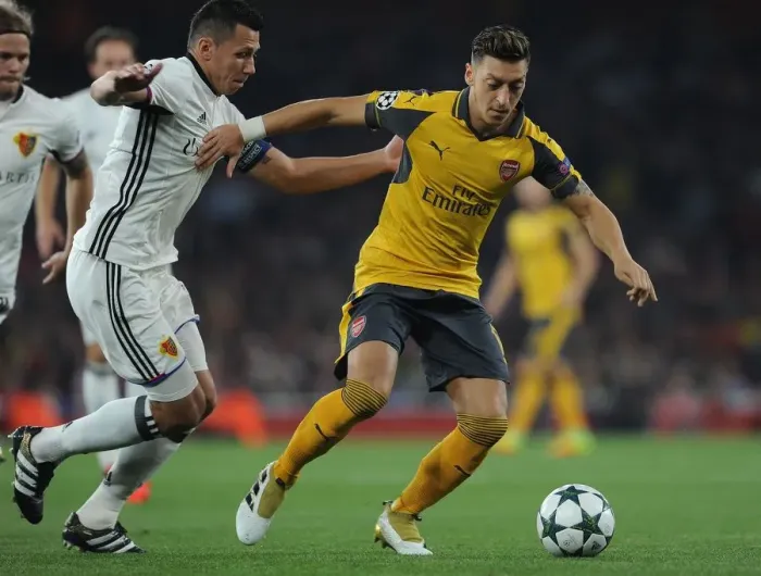Framed Print : Mesut Ozil vs Marek Suchy: A Battle at the Emirates - Arsenal FC vs FC Basel UEFA Champions League Framed Print : Mesut Ozil vs Marek Suchy: A Battle at the Emirates - Arsenal FC vs FC Basel UEFA Champions League