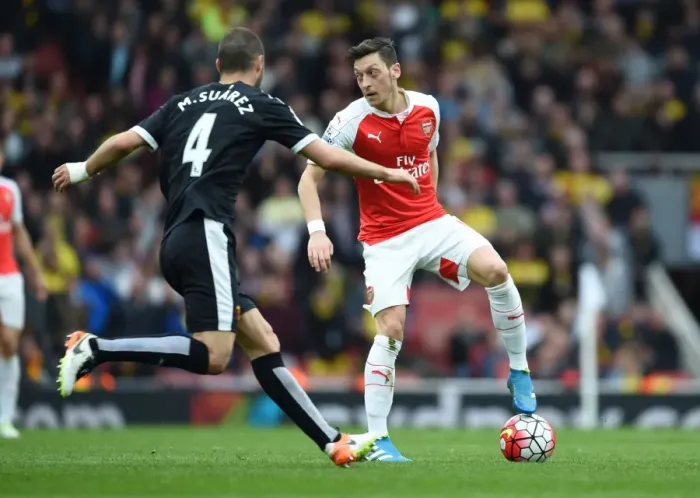 Framed Print : Mesut Ozil vs. Mario Suarez: A Premier League Showdown at Arsenal vs. Watford Framed Print : Mesut Ozil vs. Mario Suarez: A Premier League Showdown at Arsenal vs. Watford