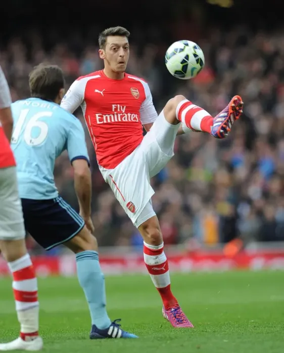 Framed Print : Mesut Ozil vs Mark Noble: Battle for Midfield Supremacy - Arsenal v West Ham United, Premier League 2015