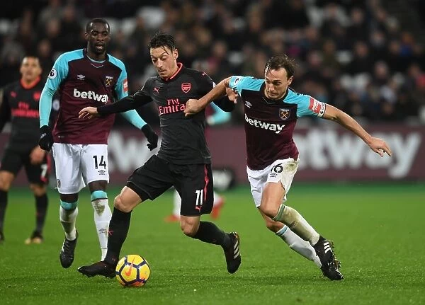 Mesut Ozil vs Mark Noble: Battle in the Premier League between West Ham and Arsenal