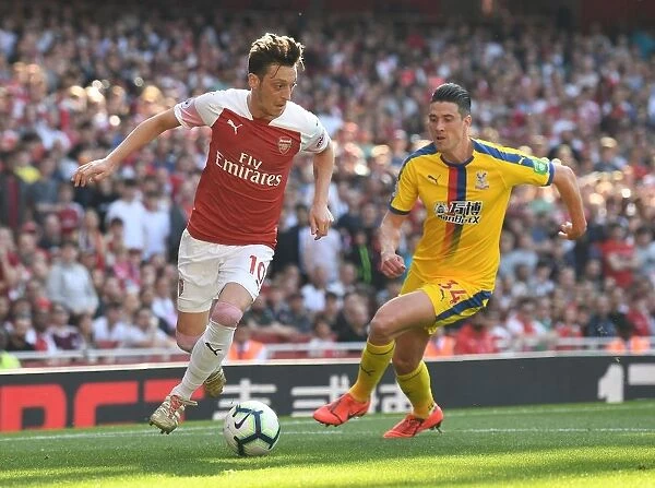 Mesut Ozil vs. Martin Kelly: Intense Moment from Arsenal's Clash with Crystal Palace