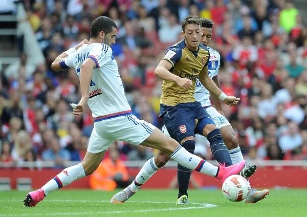 Mesut Ozil vs. Maxime Gonalons: A Tactical Showdown at the Emirates Cup