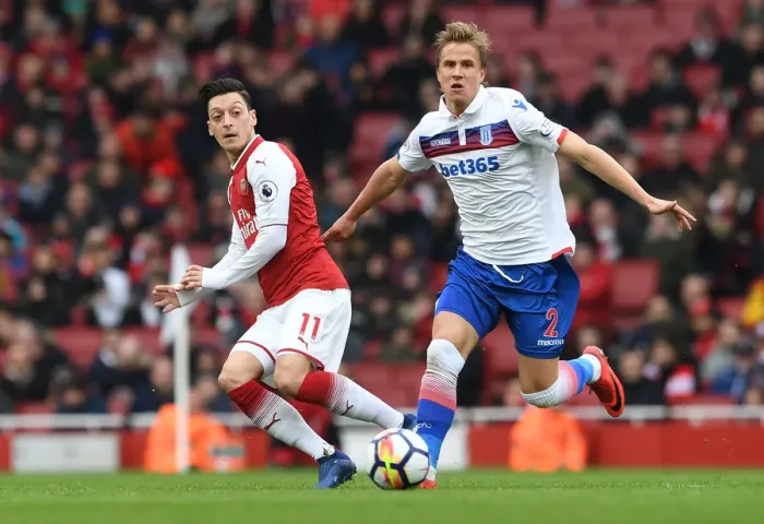 Framed Print : Mesut Ozil vs Moritz Bauer: Intense Battle at Arsenal's Emirates Stadium (Arsenal v Stoke City, 2017-18) Framed Print : Mesut Ozil vs Moritz Bauer: Intense Battle at Arsenal's Emirates Stadium (Arsenal v Stoke City, 2017-18)