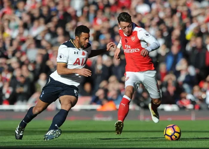 Framed Print : Mesut Ozil vs. Mousa Dembele: A Midfield Duel in the Arsenal vs. Tottenham Rivalry (2016-17 Premier League) Framed Print : Mesut Ozil vs. Mousa Dembele: A Midfield Duel in the Arsenal vs. Tottenham Rivalry (2016-17 Premier League)