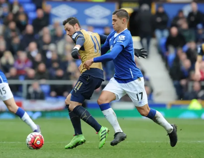 Framed Print : Mesut Ozil vs Muhamed Besic: A Premier League Showdown at Goodison Park