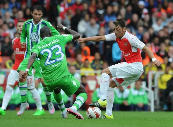 Framed Print : Mesut Ozil vs. Naldo: Intense Face-Off at the Emirates Cup, 2015 Framed Print : Mesut Ozil vs. Naldo: Intense Face-Off at the Emirates Cup, 2015