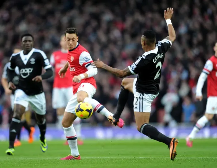 Framed Print : Mesut Ozil vs. Nathaniel Clyne: Intense Battle at Arsenal v Southampton (2013-14)