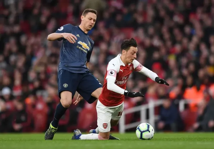 Framed Print : Mesut Ozil vs Nemanja Matic: Clash at the Emirates - Arsenal v Manchester United (2018-19) Framed Print : Mesut Ozil vs Nemanja Matic: Clash at the Emirates - Arsenal v Manchester United (2018-19)