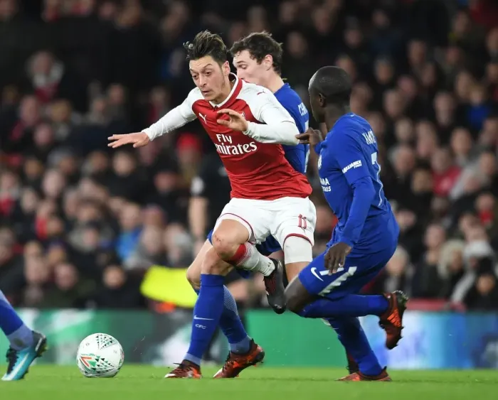 Framed Print : Mesut Ozil vs. N'Golo Kante: A Carabao Cup Showdown of Midfield Maestros Framed Print : Mesut Ozil vs. N'Golo Kante: A Carabao Cup Showdown of Midfield Maestros