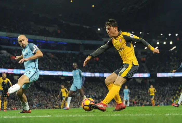 Framed Print : Mesut Ozil vs Pablo Zabaleta: Intense Battle at Etihad Stadium (Manchester City vs Arsenal, 2016-17)