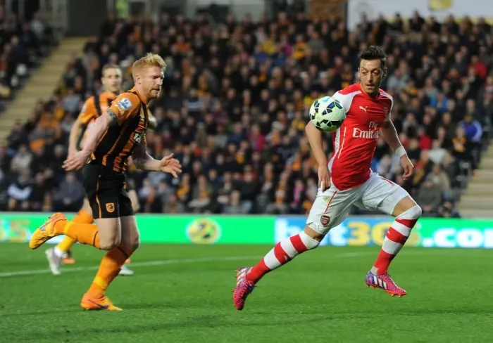 Framed Print : Mesut Ozil vs. Paul McShane: A Premier League Showdown at Hull City (2014 / 15)
