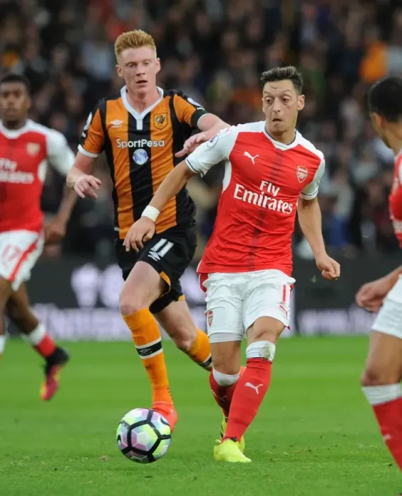 Framed Print : Mesut Ozil vs Sam Clucas: A Battle of Wits in the Premier League Framed Print : Mesut Ozil vs Sam Clucas: A Battle of Wits in the Premier League