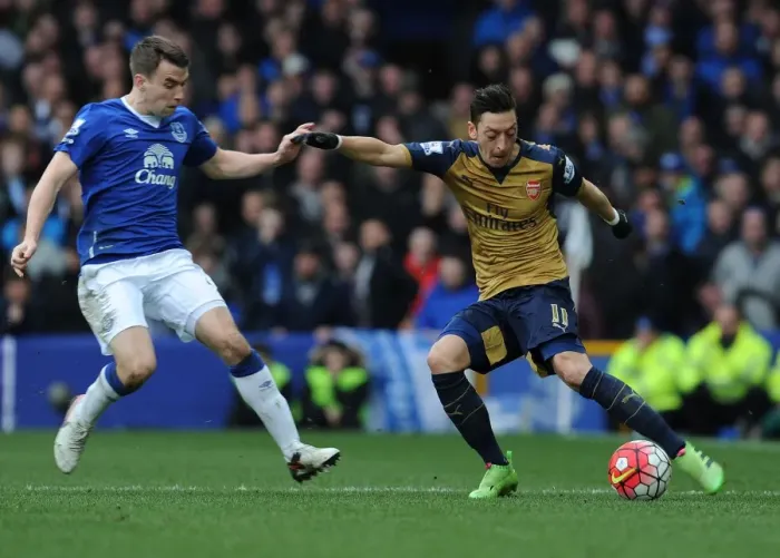 Framed Print : Mesut Ozil vs Seamus Coleman: A Battle at Goodison Park, Premier League 2015-16