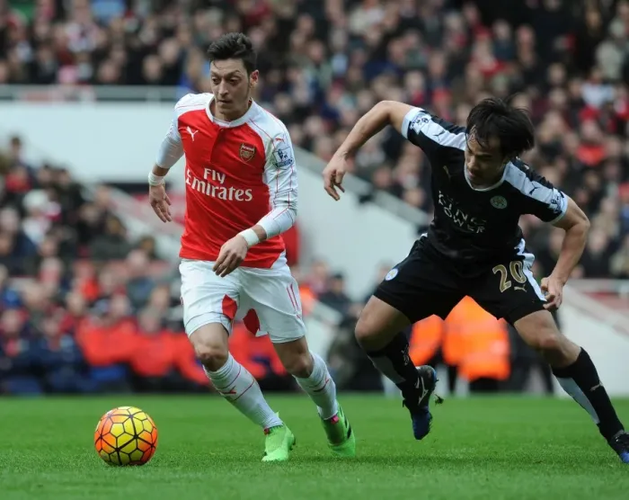 Framed Print : Mesut Ozil vs Shinji Okazaki: A Premier League Showdown at the Emirates Framed Print : Mesut Ozil vs Shinji Okazaki: A Premier League Showdown at the Emirates