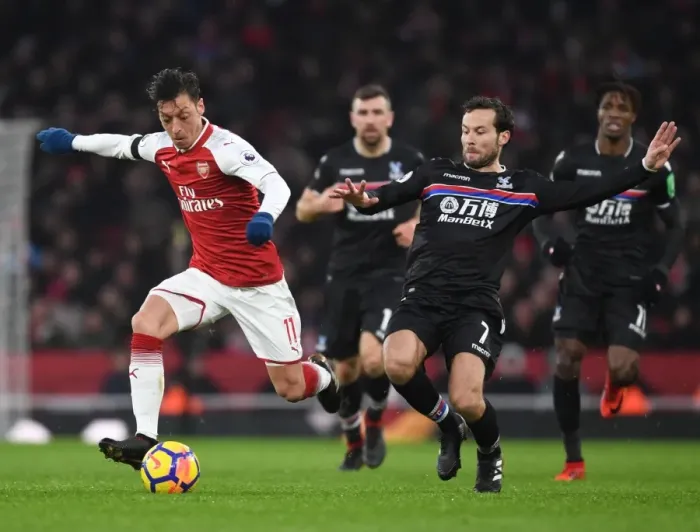 Framed Print : Mesut Ozil vs Yohan Cabaye: A Midfield Showdown in Arsenal vs Crystal Palace