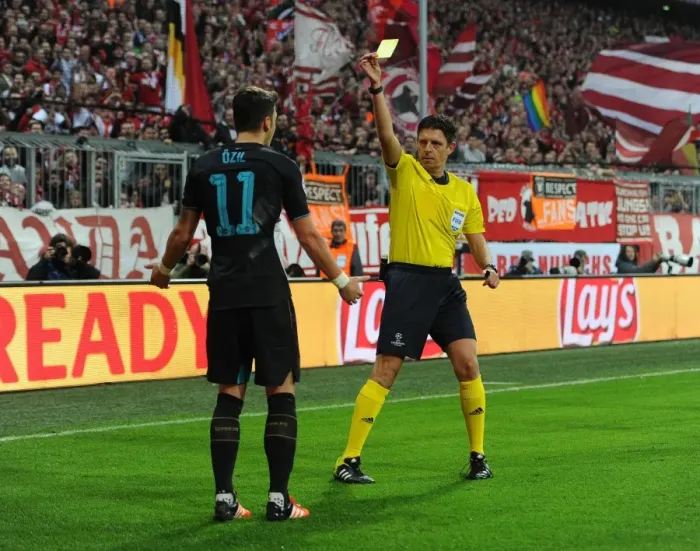 Framed Print : Mesut Ozil Yelled at by Referee in Bayern Munich vs Arsenal Champions League Match Framed Print : Mesut Ozil Yelled at by Referee in Bayern Munich vs Arsenal Champions League Match