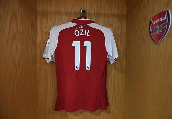 Mesut Ozil's Abandoned Arsenal Shirt: A Silent Statement from the Emirates Changing Room (Arsenal vs. Chelsea, 2017-18)