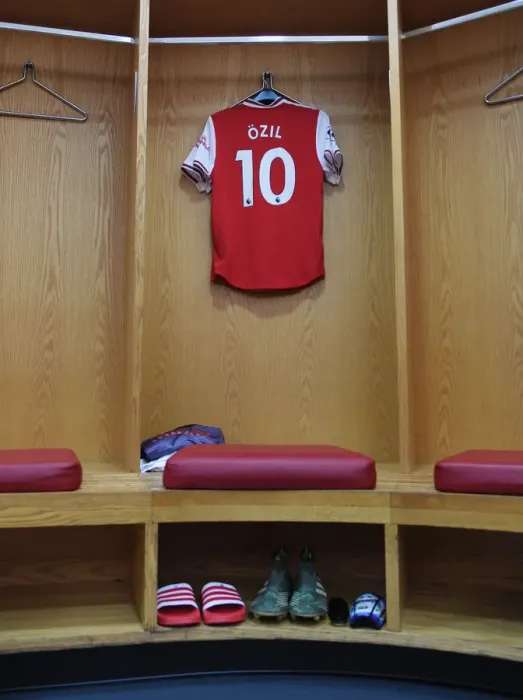 Framed Print : Mesut Ozil's Focus: Arsenal FC's Star Player Prepares for Battle against Brighton & Hove Albion (Premier League 2019-20)