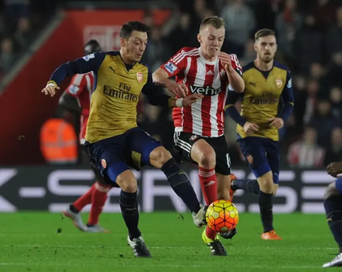 Framed Print : Mesut Ozil's Masterful Performance: Outsmarting James Ward-Prowse at Southampton, Premier League 2015-16