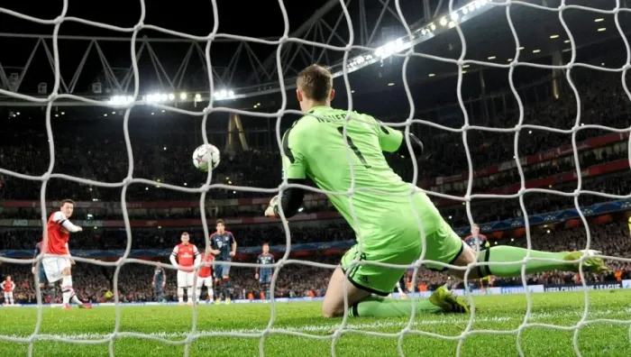 Framed Print : Mesut Ozil's Penalty Saved by Manuel Neuer: Arsenal vs. Bayern Munich, UEFA Champions League 2013-14 Framed Print : Mesut Ozil's Penalty Saved by Manuel Neuer: Arsenal vs. Bayern Munich, UEFA Champions League 2013-14