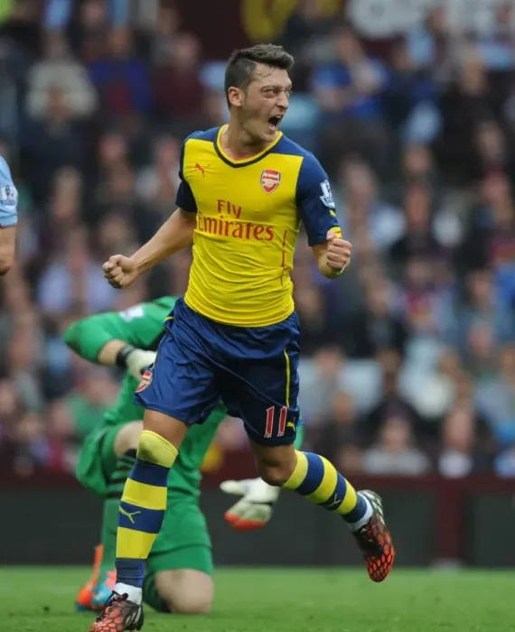 Framed Print : Mesut Ozil's Signature Moment: Scoring First for Arsenal Against Aston Villa in the Premier League 2014-15 Framed Print : Mesut Ozil's Signature Moment: Scoring First for Arsenal Against Aston Villa in the Premier League 2014-15