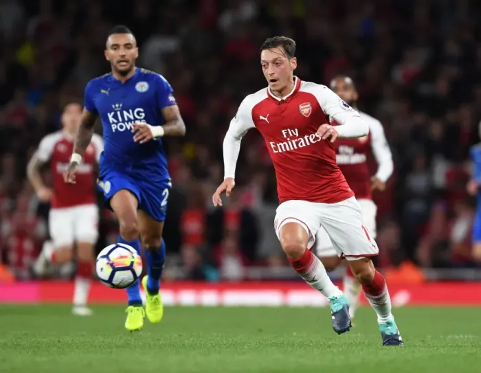 Framed Print : Mesut Ozil's Slick Move: Outsmarting Danny Simpson in Premier League Action Framed Print : Mesut Ozil's Slick Move: Outsmarting Danny Simpson in Premier League Action
