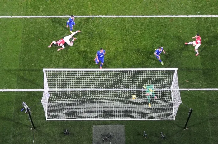 Framed Print : Mesut Ozil's Stunning Goal vs. Everton: Arsenal's German Star Scores Past Tim Howard in Premier League Showdown, 2013-14 Season