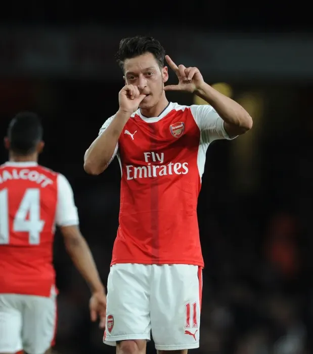 Framed Print : Mesut Ozil's Thrilling Goal Celebration: Arsenal vs. West Ham United, Premier League 2016-17