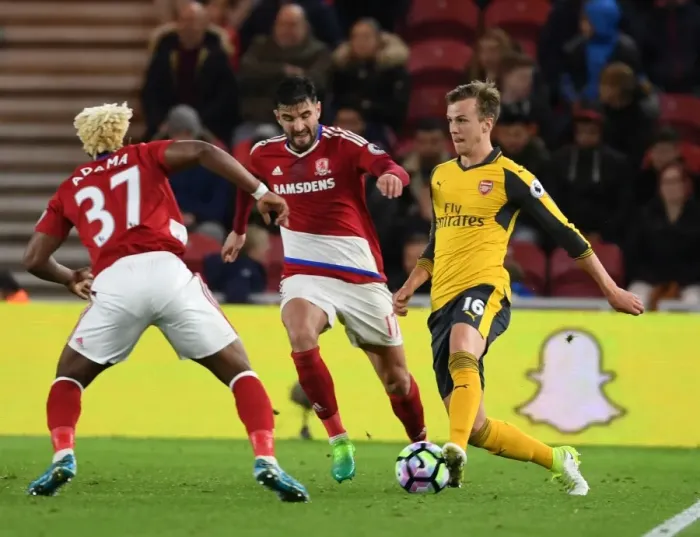 Framed Print : Middlesbrough vs Arsenal: Rob Holding Stands Firm Against Adama Traore and Antonio Barragan
