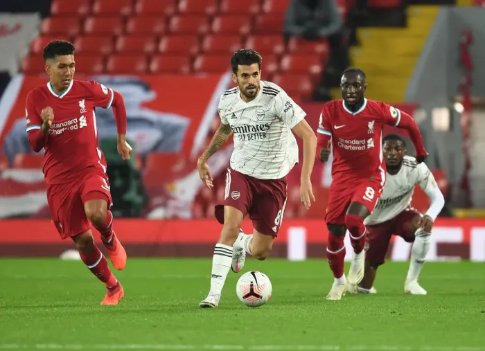 Framed Print : Midfield Showdown: Dani Ceballos vs. Roberto Firmino - Empty Anfield Battle in the 2020-21 Premier League