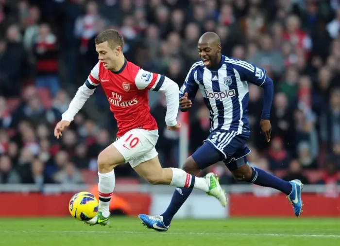 Framed Print : Midfield Showdown: Jack Wilshere vs Youssouf Mulumbu, Arsenal vs West Bromwich Albion, Premier League 2012-13 Framed Print : Midfield Showdown: Jack Wilshere vs Youssouf Mulumbu, Arsenal vs West Bromwich Albion, Premier League 2012-13