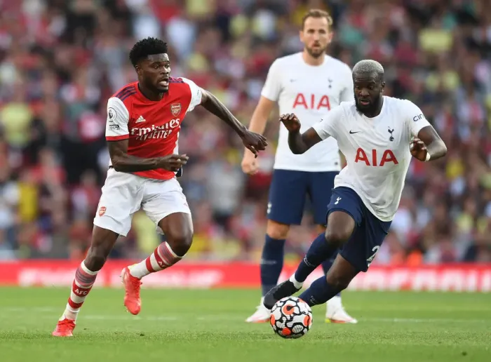 Framed Print : Midfield Showdown: Partey vs. Ndombele - Arsenal vs. Tottenham Premier League Clash (2021-22)