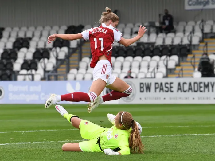 Framed Print : Miedema vs. Moloney: A Fight for Supremacy in the FA WSL