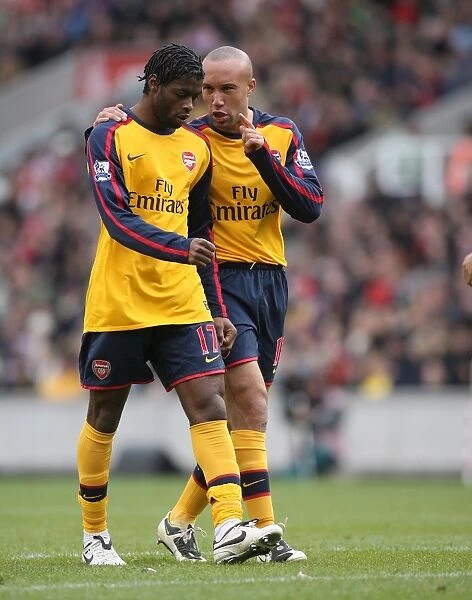 Mikael Silvestre and Alex Song (Arsenal)
