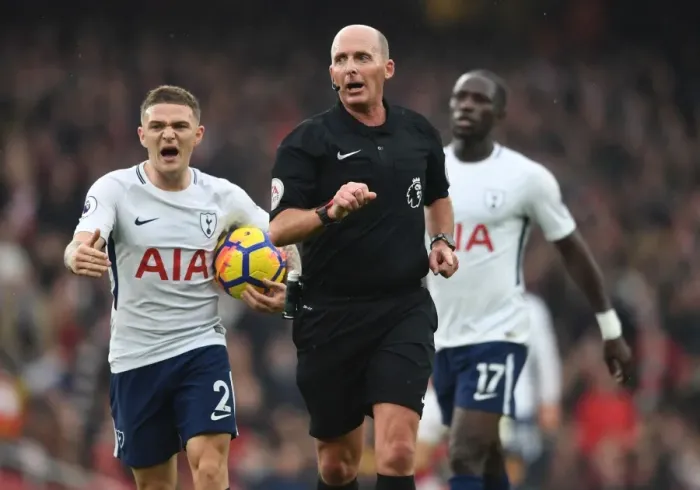 Framed Print : Mike Dean Overssees Tense Arsenal vs. Tottenham Clash in Premier League