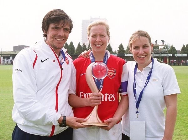 Mike Irving (Coach), Jayne Ludlow and Emma Hayes (Arsenal Coach) with the European Trophy