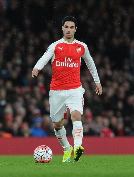 Mikel Arteta in Action: Arsenal's Midfield Maestro Shines in FA Cup Clash Against Sunderland (2015-16)