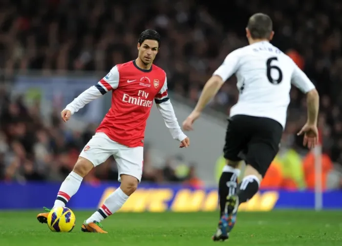 Framed Print : Mikel Arteta (Arsenal) Chris Baird (Fulham). Arsenal 3: 3 Fulham. Barclays Premier League Framed Print : Mikel Arteta (Arsenal) Chris Baird (Fulham). Arsenal 3: 3 Fulham. Barclays Premier League